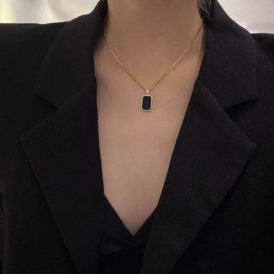 “DIEYURO 316L Stainless Steel Rectangular Pendant Necklace for Women.”