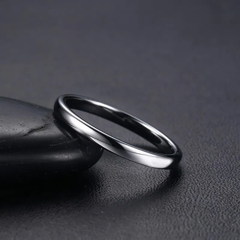“Anti-scratch tungsten wedding rings, simple classic bands, durable couples jewelry, timeless design.”