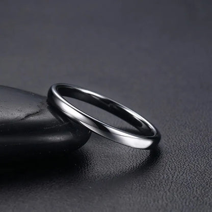 “Anti-scratch tungsten wedding rings, simple classic bands, durable couples jewelry, timeless design.”
