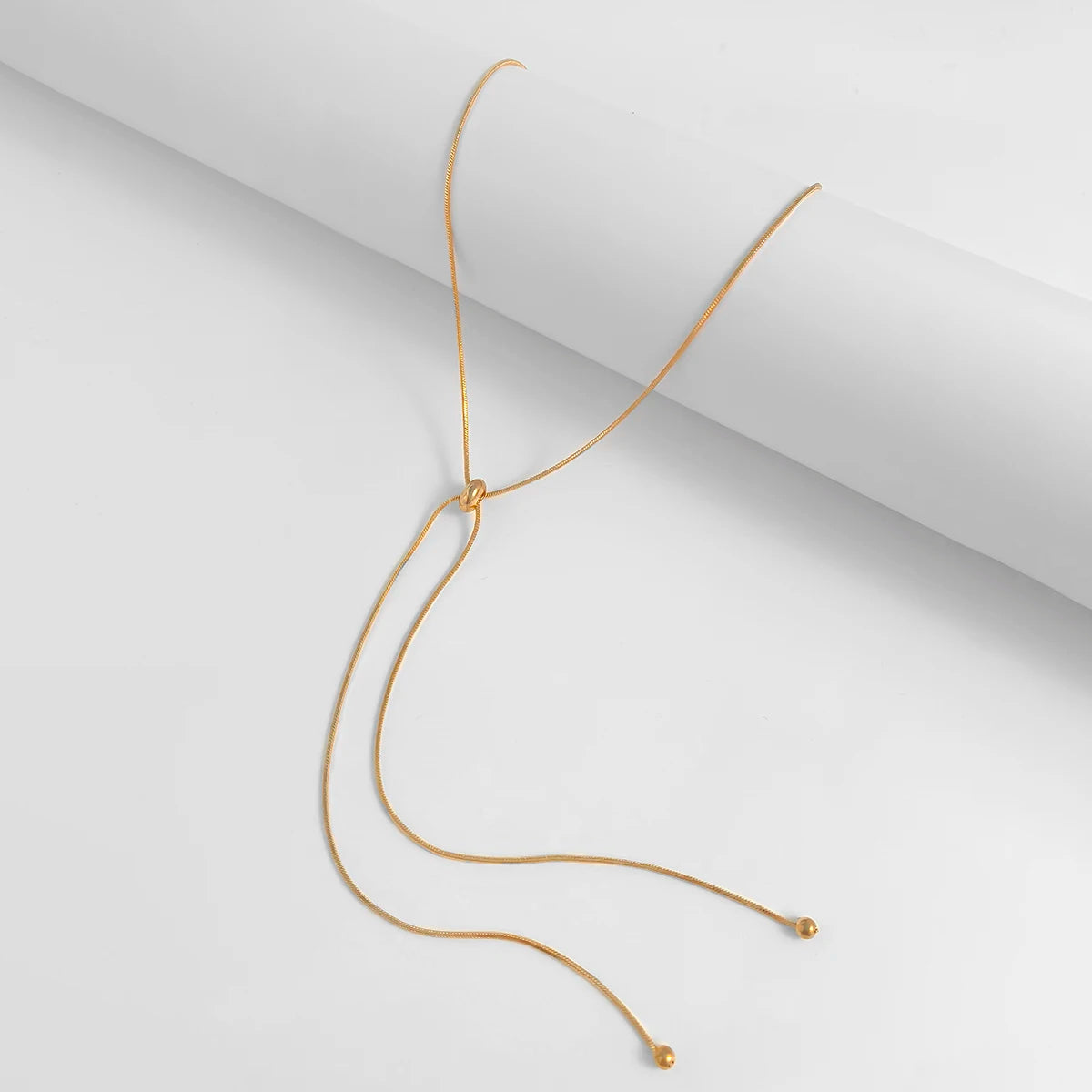“Snake Chain Choker Necklace - Ball Pendant Party Jewelry.”