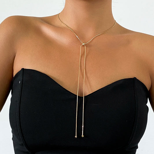 “Snake Chain Choker Necklace - Ball Pendant Party Jewelry.”