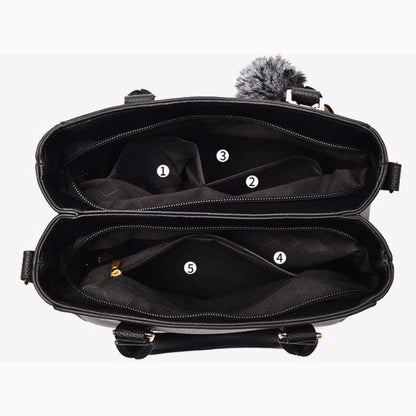 “Embroidered leather handbag for women with hairball detail, stylish and versatile.”