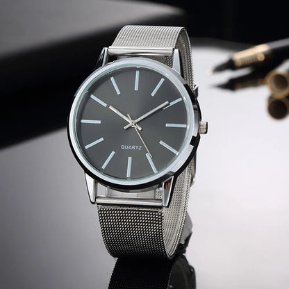 “Luxury Women’s Quartz Watch, Minimalist Silver Design, Stylish Business Accessory.”