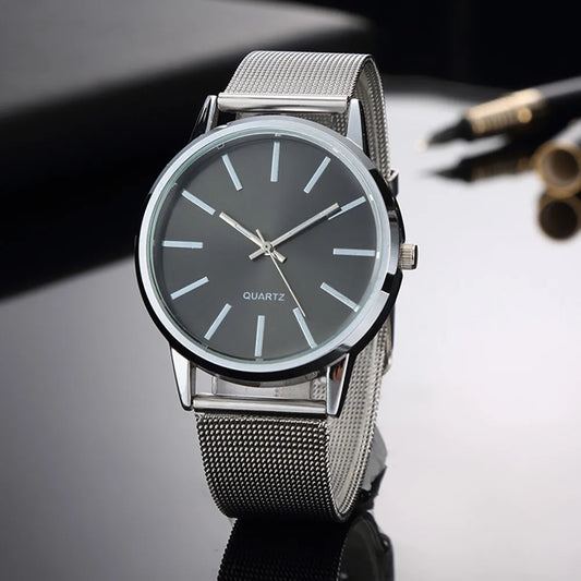 “Luxury Women’s Quartz Watch, Minimalist Silver Design, Stylish Business Accessory.”