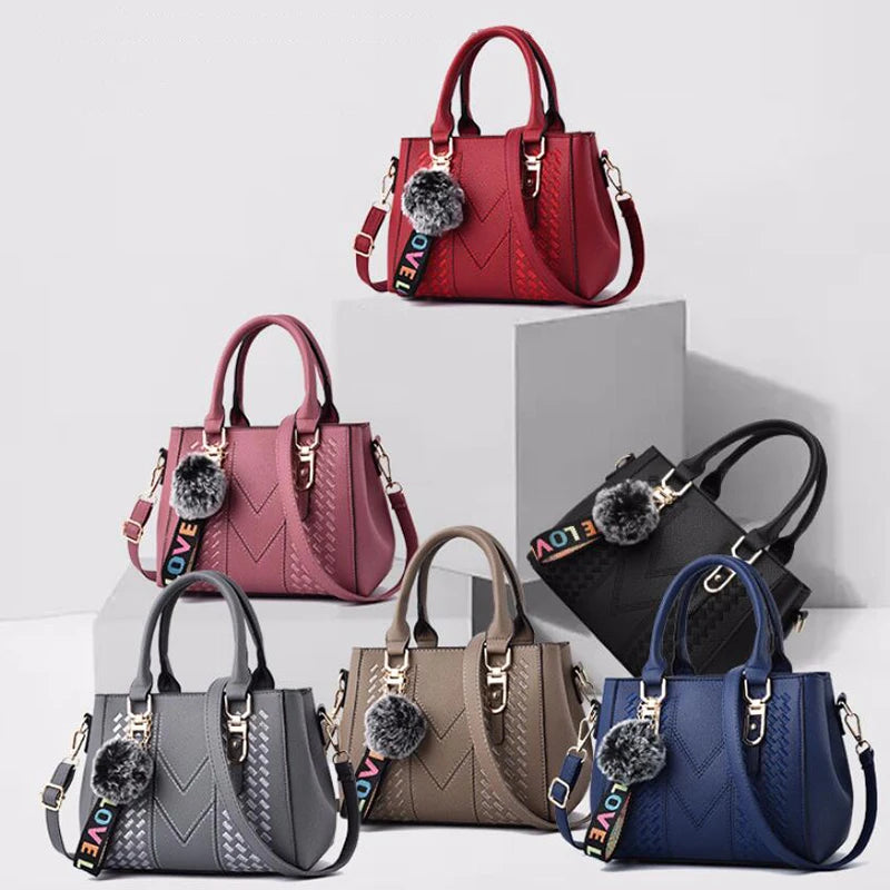 “Embroidered leather handbag for women with hairball detail, stylish and versatile.”