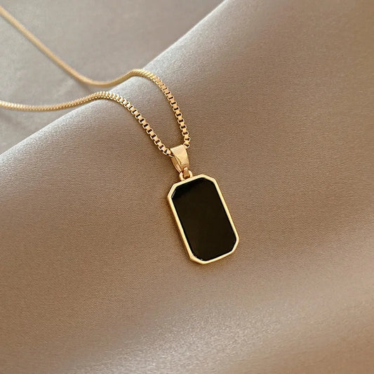 “DIEYURO 316L Stainless Steel Rectangular Pendant Necklace for Women.”