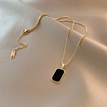 “DIEYURO 316L Stainless Steel Rectangular Pendant Necklace for Women.”