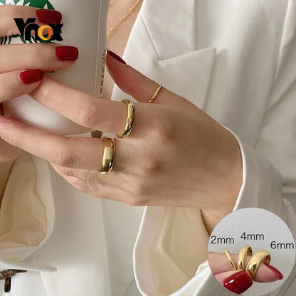 “Anti-scratch tungsten wedding rings, simple classic bands, durable couples jewelry, timeless design.”