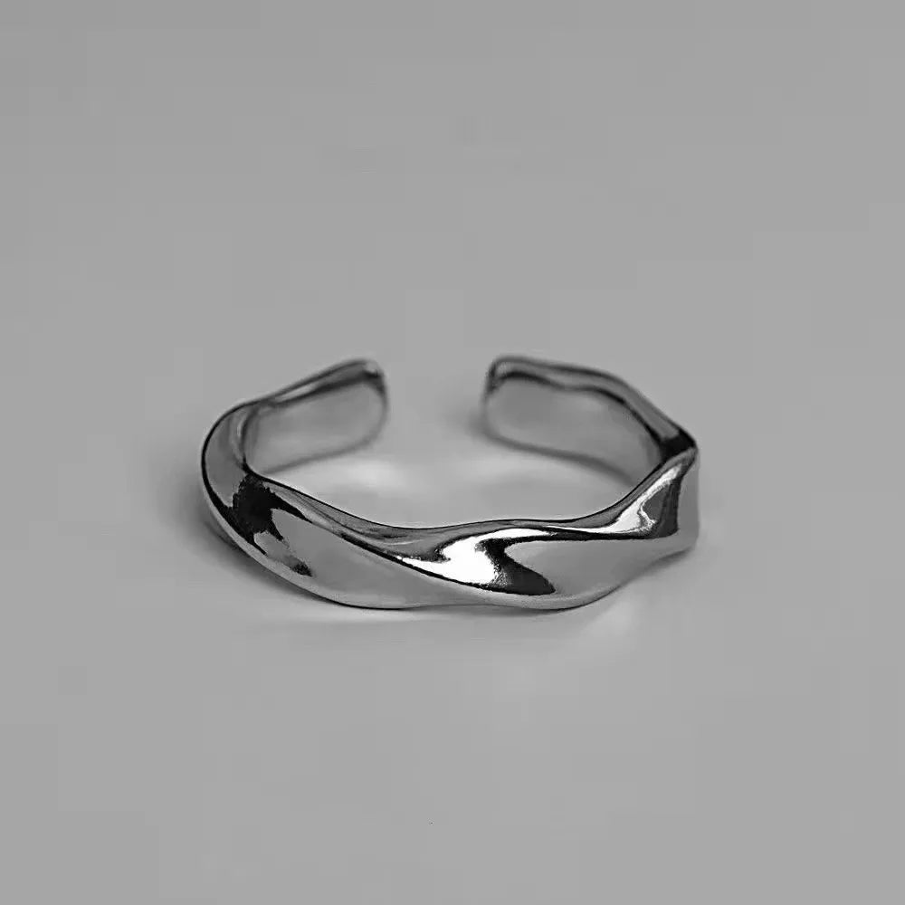 “Mobius Wave Ring - Silver Color Alloy Open Ring for Women & Men, Retro Style.”