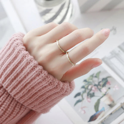 “SUNIBI Frosted Stainless Steel Ring - Simple Gold Color Wedding Jewelry for Women.”
