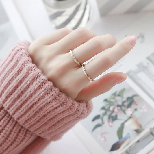 “SUNIBI Frosted Stainless Steel Ring - Simple Gold Color Wedding Jewelry for Women.”