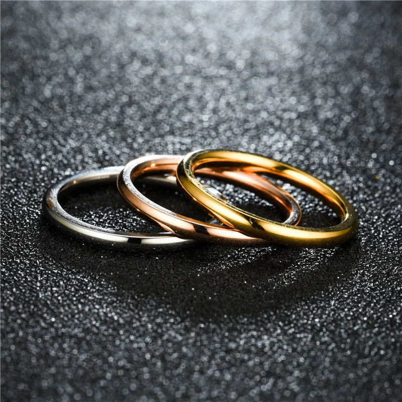 “2mm Thin Stainless Steel Rings - Rose Gold Titanium Steel for Women & Girls.”