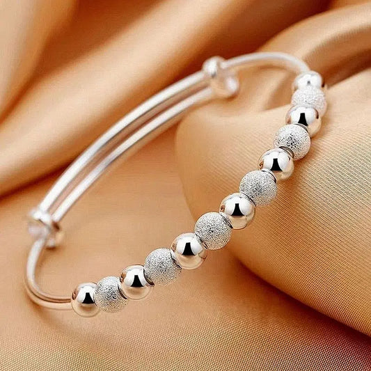 “925 Silver-Color Luxury Charms Beads Bracelet - Adjustable Fashion Jewelry for Women.”