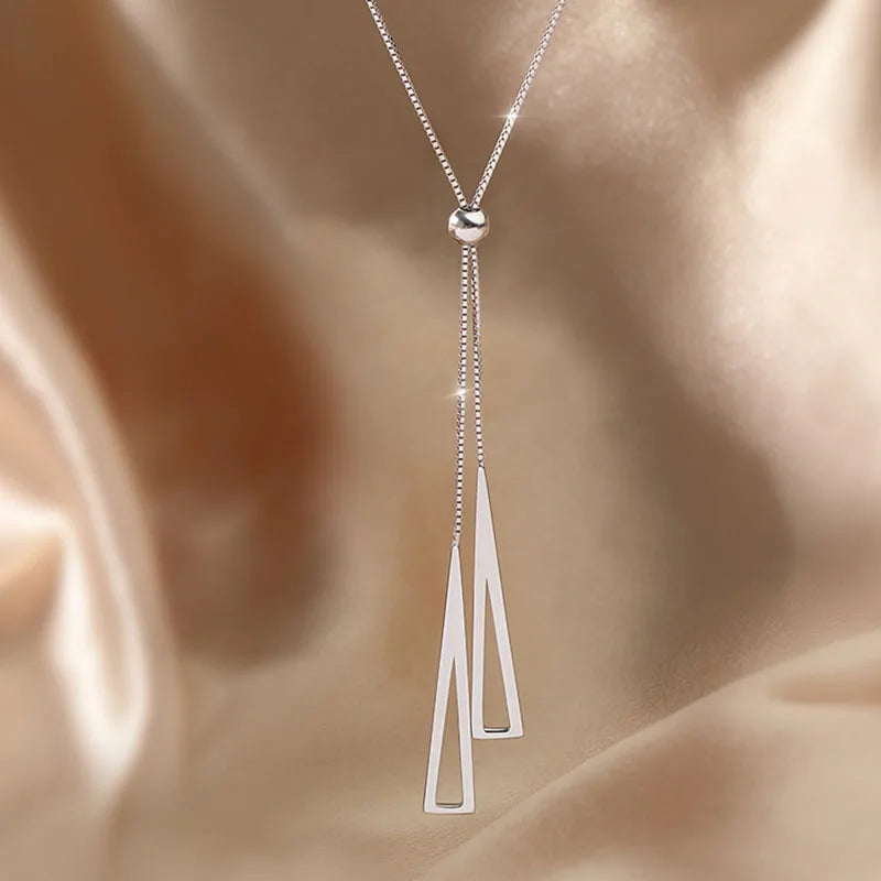 “Tassel Necklace for Women - Gold/Silver Triangle Pendant Long Necklace.”