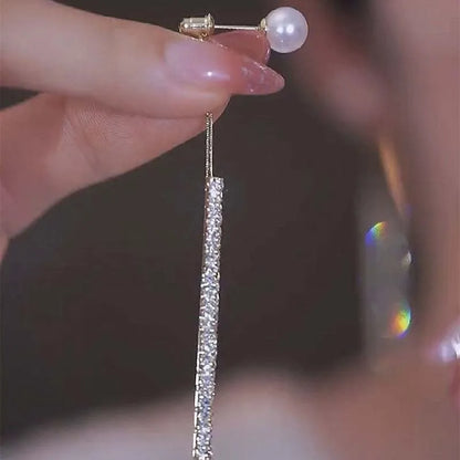 “Korean Tassel Pearl Drop Earrings - Luxury Gold Wedding Jewelry.”