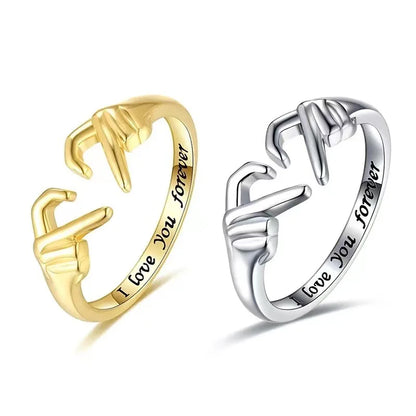 “Romantic Heart Hand Hug Ring - Adjustable Couple Ring for Wedding & Dating.”