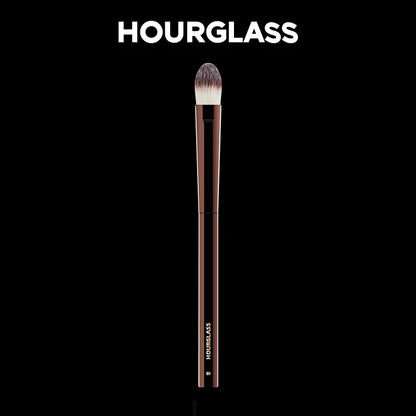 “Large concealer brush, soft fiber hair, flawless coverage, stylish makeup tool.”