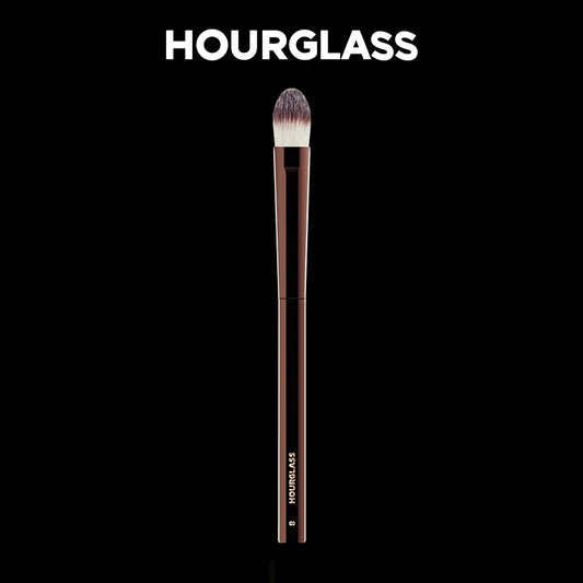 “Large concealer brush, soft fiber hair, flawless coverage, stylish makeup tool.”