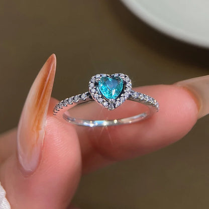 “Shiny Zircon Heart Ring - 925 Sterling Silver Luxury Jewelry for Engagements & Weddings.”