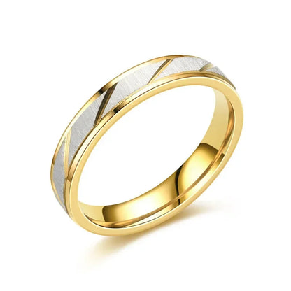 “Gold wave-pattern couple rings, stainless steel, perfect for weddings or promises.”