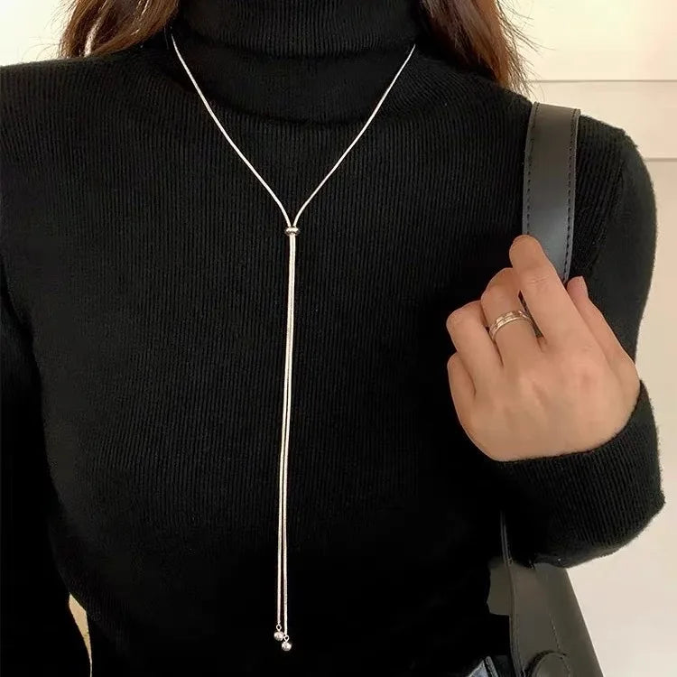 “Simple Long Tassel Necklace – Titanium Steel Sweater Chain Design”