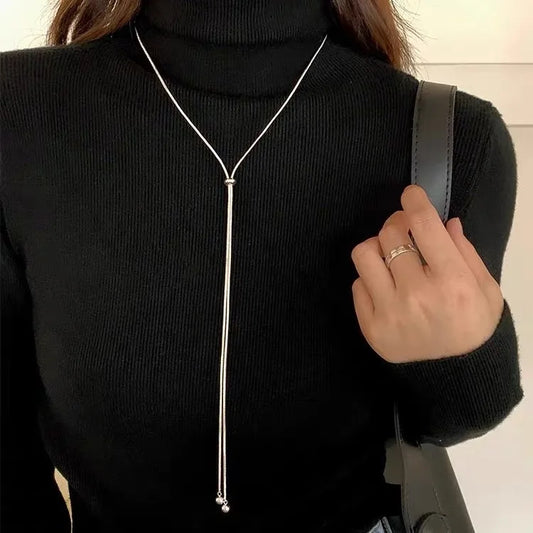 “Simple Long Tassel Necklace – Titanium Steel Sweater Chain Design”