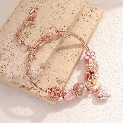 “Fashion rose and swan charm bracelet, elegant accessory for parties or daily wear.”