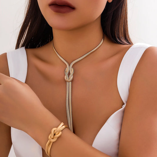 “2-piece set: smooth long snake chain necklace and bracelet, vintage Y2K style.”