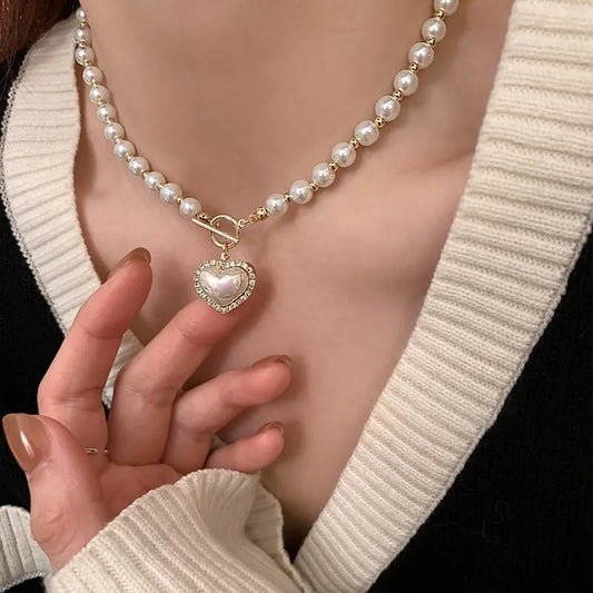 “Elegant Pearl Necklace for Women - Heart Pendant, Luxury Imitation Pearls, Korean Jewelry.”