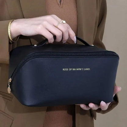 “Luxury makeup organizer bag, zippered, portable travel case for toiletries and cosmetics.”