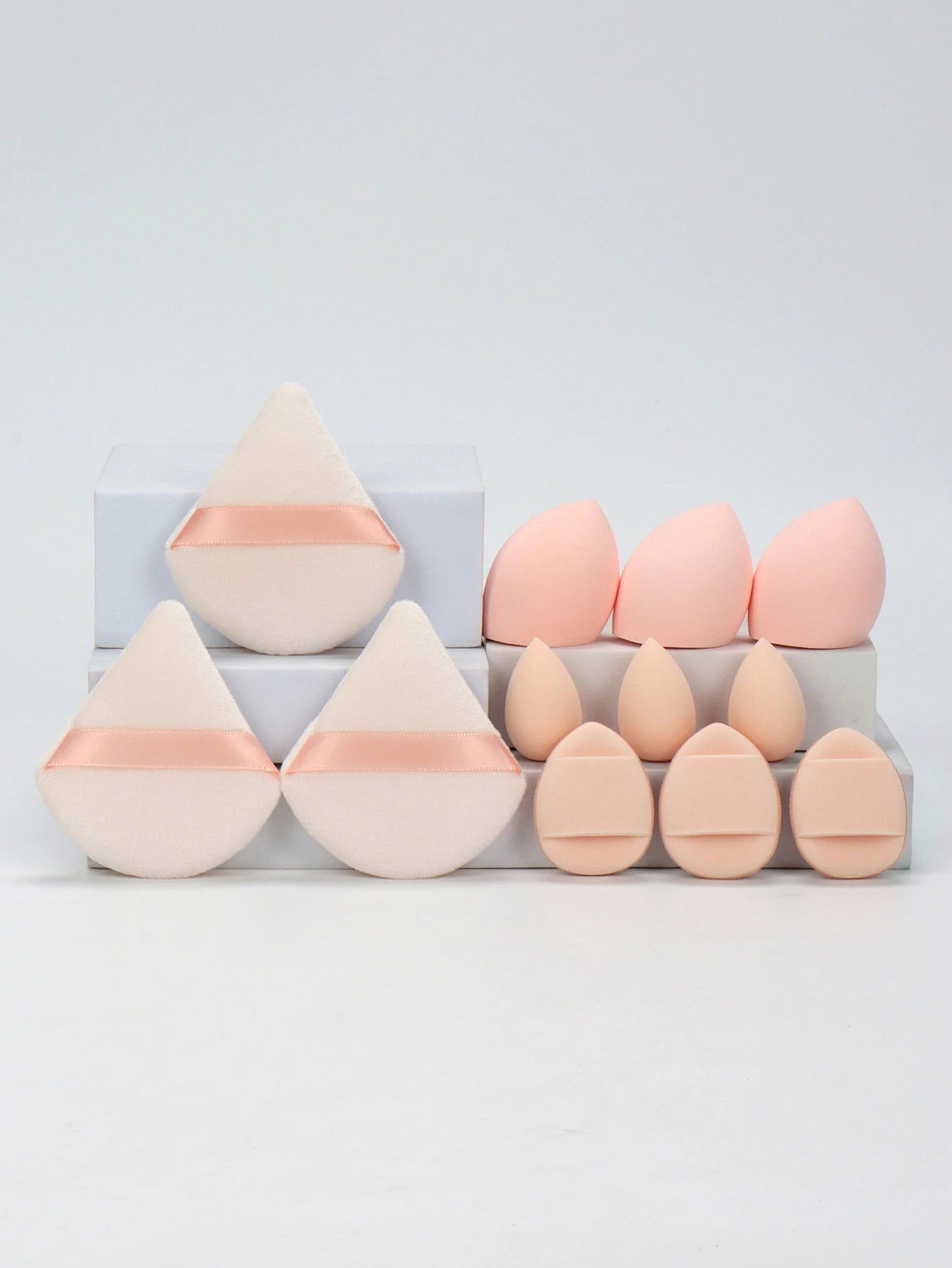 “12-piece makeup sponge set: powder puffs, air cushion puffs, and beauty eggs.”
