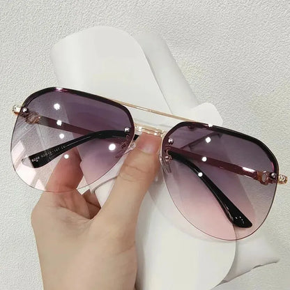 “Metal half-frame women’s sunglasses, classic double-beam design for outdoor fashion.”
