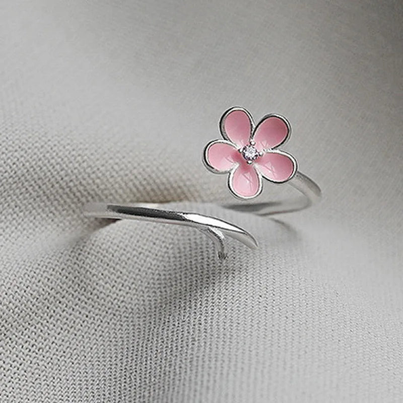 “Luxury Zircon Flower Rings for Women - Rose, Cherry Blossom, Tulip Design, Adjustable.”