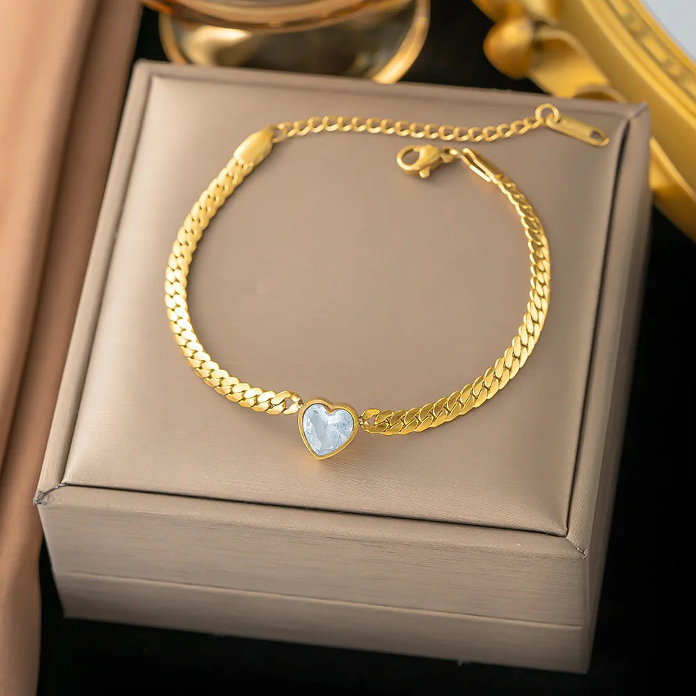 “Stainless Steel Heart-Shaped Green & White Crystal Pendant Necklace & Bracelet Set.”
