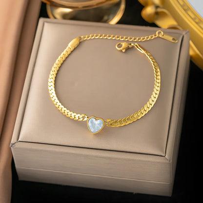“Stainless Steel Heart-Shaped Green & White Crystal Pendant Necklace & Bracelet Set.”