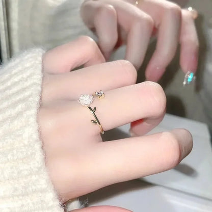 “Luxury Zircon Flower Rings for Women - Rose, Cherry Blossom, Tulip Design, Adjustable.”