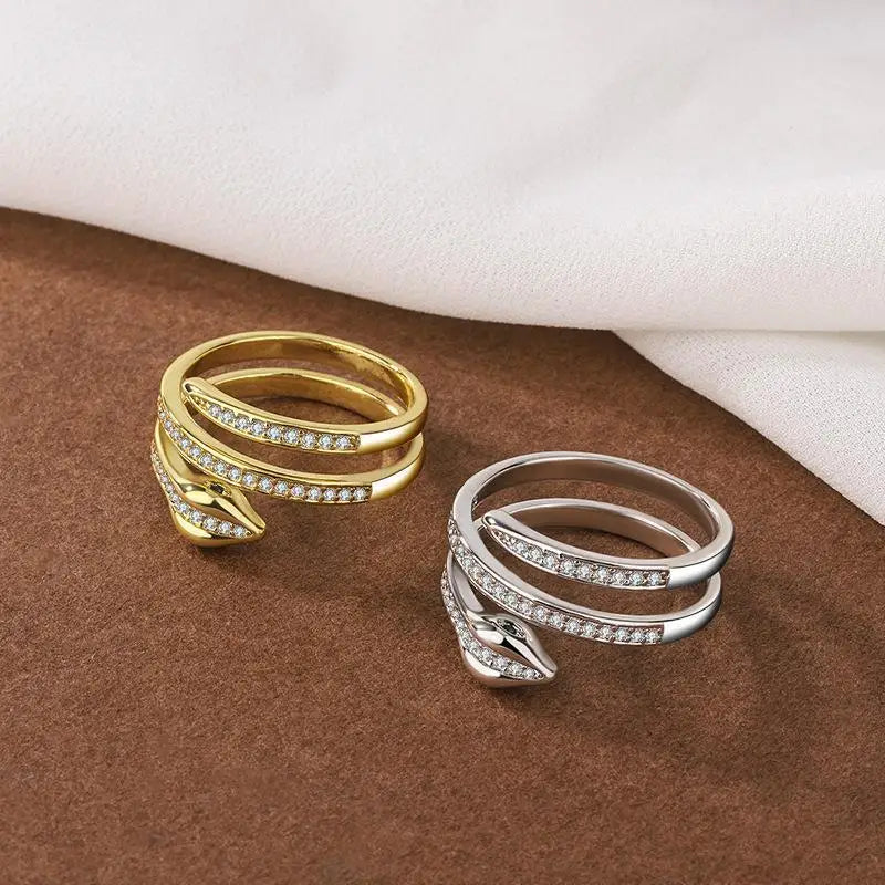 “Gold snake rings, adjustable, punk hip-hop style, stainless steel with zircon details.”