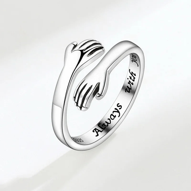 “Romantic Heart Hand Hug Ring - Adjustable Couple Ring for Wedding & Dating.”