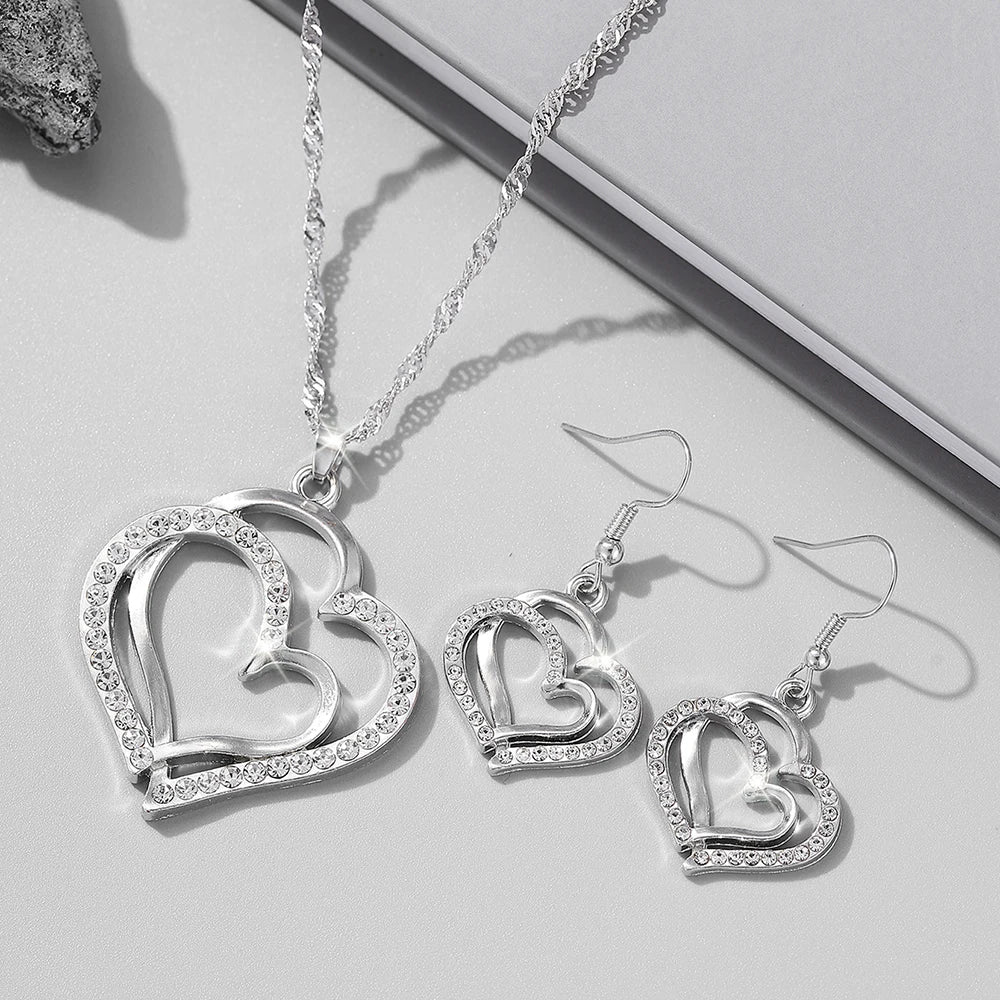 “3-Piece Heart-Shaped Jewelry Set - Earrings, Pendant, Necklace with Rhinestones.”