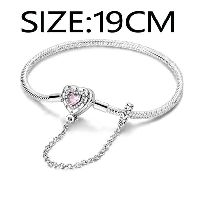 “Silver plated charm bracelet with safety chain, snake chain fits beads, perfect gift.”