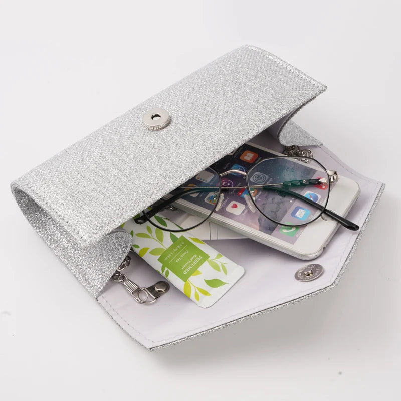 “Glitter Evening Bag for Women, Shiny Silver Party Clutch with Chain Strap.”