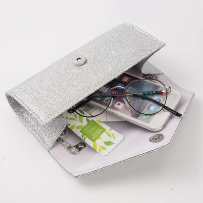 “Glitter Evening Bag for Women, Shiny Silver Party Clutch with Chain Strap.”