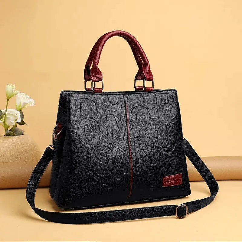 “PU leather crossbody bag, casual luxury design, large capacity for travel.”