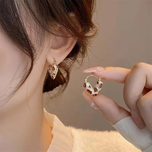 “Trendy red dripping oil heart hoop earrings for women, elegant Korean-style love dangle earrings, perfect as a gift.”