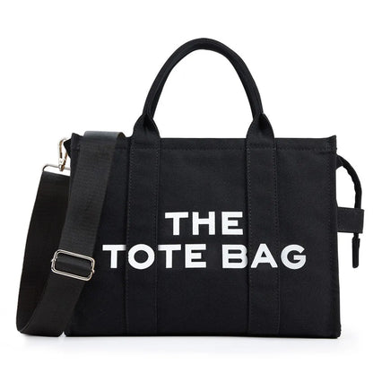 “Designer canvas tote bag, large capacity, adjustable shoulder strap, crossbody style.”