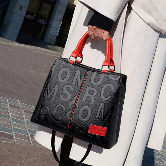 “PU leather crossbody bag, casual luxury design, large capacity for travel.”