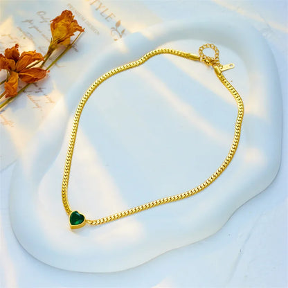 “Stainless Steel Heart-Shaped Green & White Crystal Pendant Necklace & Bracelet Set.”