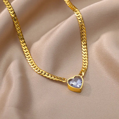 “Stainless Steel Heart-Shaped Green & White Crystal Pendant Necklace & Bracelet Set.”
