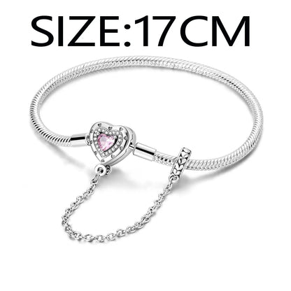 “Silver plated charm bracelet with safety chain, snake chain fits beads, perfect gift.”