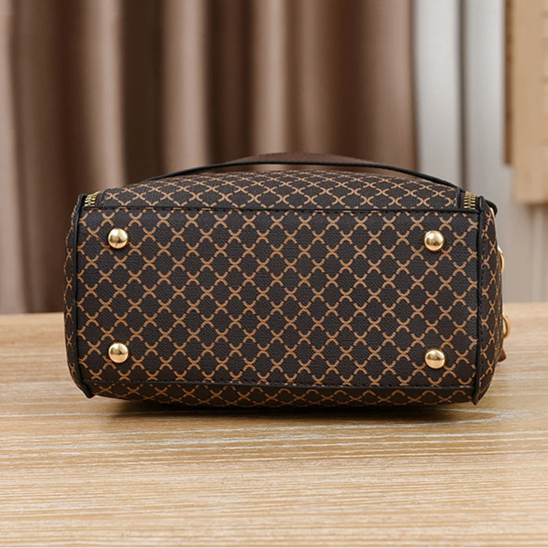 “Luxury bucket handbag for women, check print, spacious design, crossbody style.”